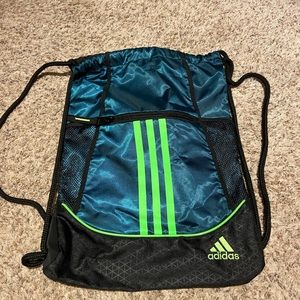 Adidas green drawstring backpack. Used one time. Huge side pockets!